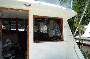 The window is held in with just the teak trim!