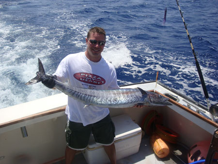 Diver Eric Koehler shows off a nice Wahoo that he got near the Proteus wreck site.   Photo courtesy Eric